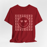Valentine Smile Tee – Heart-Eyes Smiley with XOXO Pattern